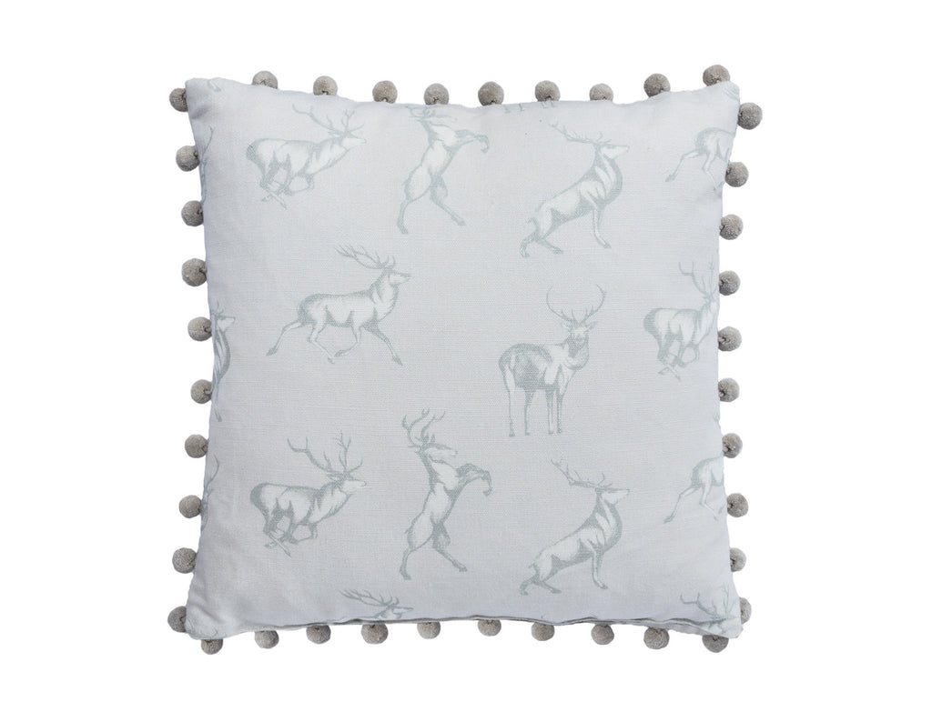 The Stag Cushion with pom poms