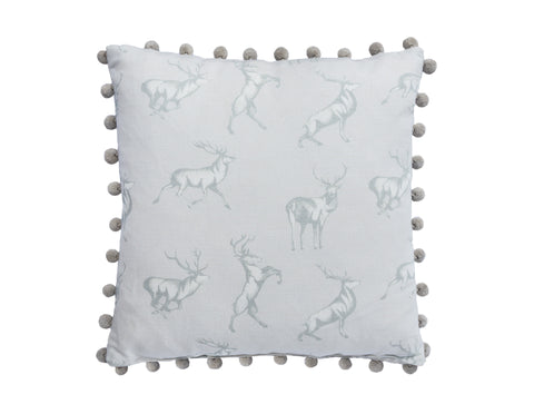 The Stag Cushion with pom poms